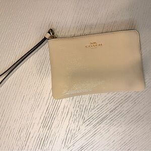 COACH Cream Leather Wristlet with Gold Logo Accent